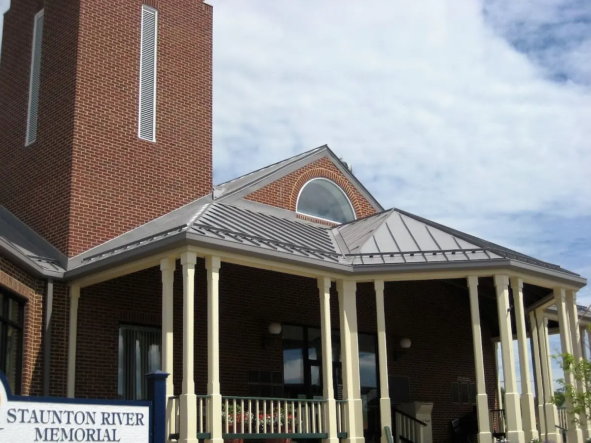 Skilled roofing craftsmen working on a residential roof in Mays Chapel